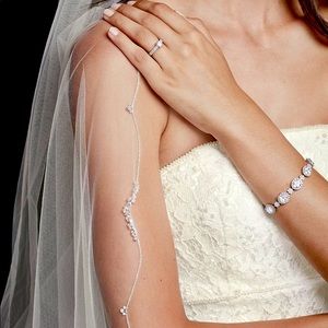 Brand new cathedral length veil, never been worn!